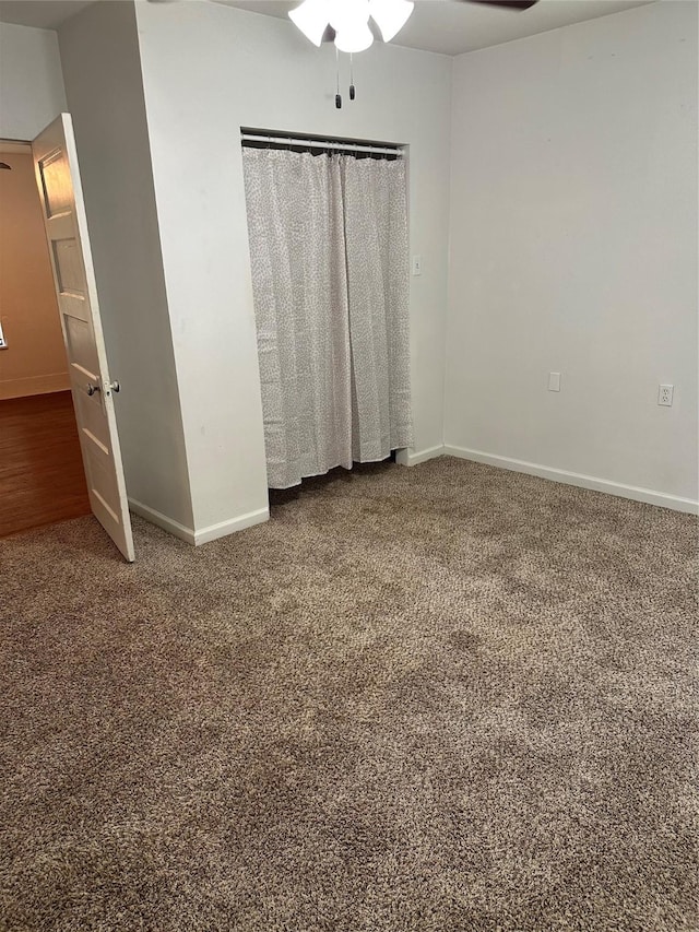 630 W College St, Stephenville, TX 76401 - unfurnished bedroom featuring carpet and baseboards