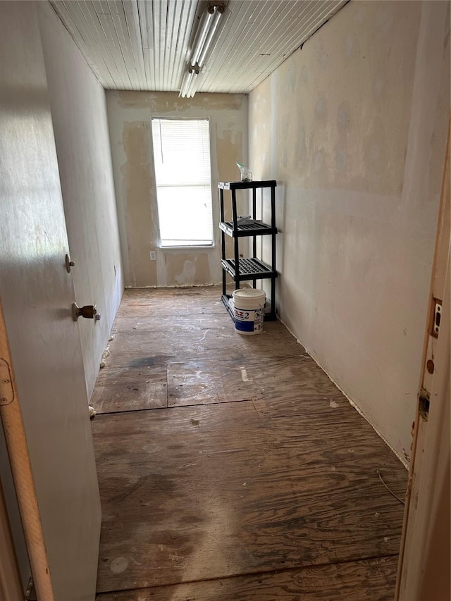 630 W College St, Stephenville, TX 76401 - corridor featuring wood-type flooring