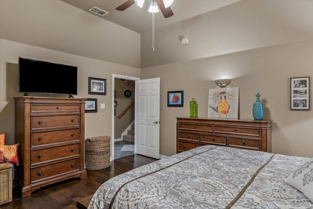 bedroom featuring a ceiling fan, high vaulted ceiling, dark wood finished floors, and visible vents