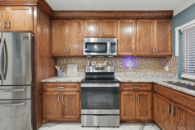 4006 Mayflower Dr, Garland, TX 75043 - kitchen with appliances with stainless steel finishes, light marble finish floors, and backsplash