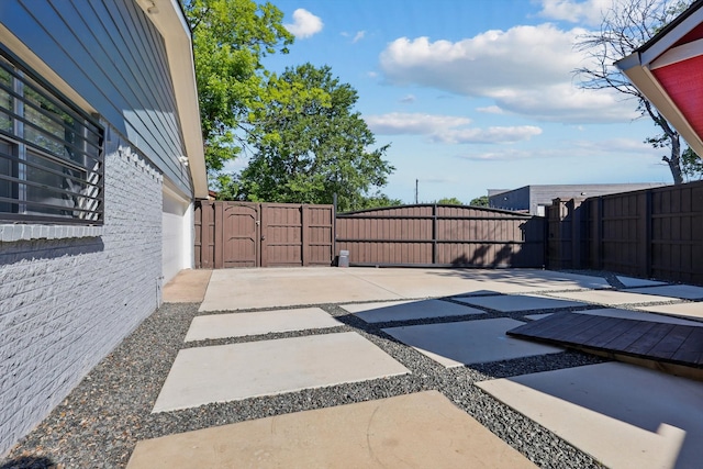 4006 Mayflower Dr, Garland, TX 75043 - view of patio / terrace featuring a gate and fence