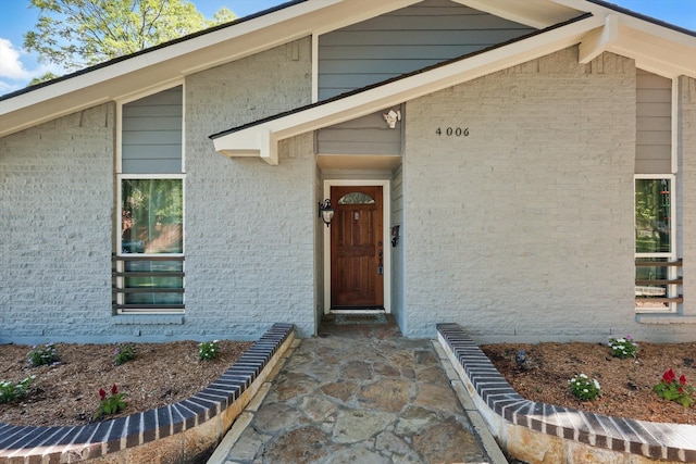 4006 Mayflower Dr, Garland, TX 75043 - view of exterior entry with brick siding