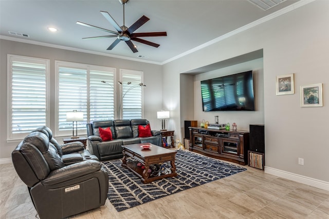 living area featuring a ceiling fan, baseboards, visible vents, and plenty of natural light