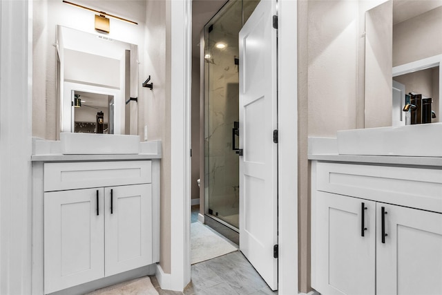 2856 Peninsula Dr, Grapevine, TX 76051 - full bath featuring vanity, baseboards, a stall shower, and marble finish floor