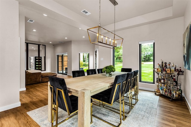 2856 Peninsula Dr, Grapevine, TX 76051 - dining area featuring baseboards, wood finished floors, and visible vents