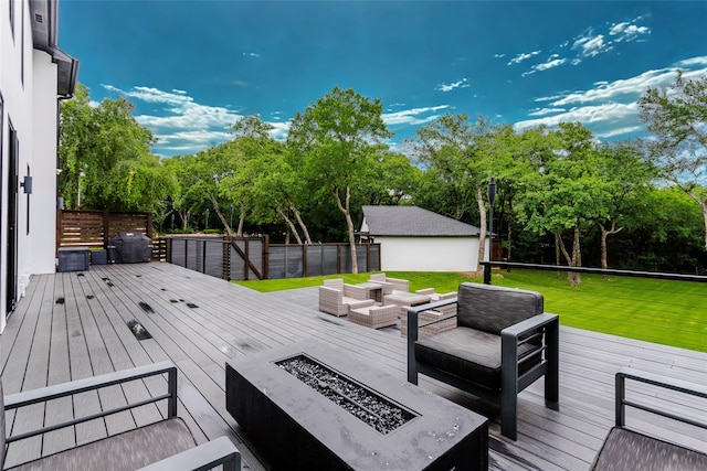 2856 Peninsula Dr, Grapevine, TX 76051 - wooden terrace featuring a fenced backyard, an outdoor living space with a fire pit, and a yard