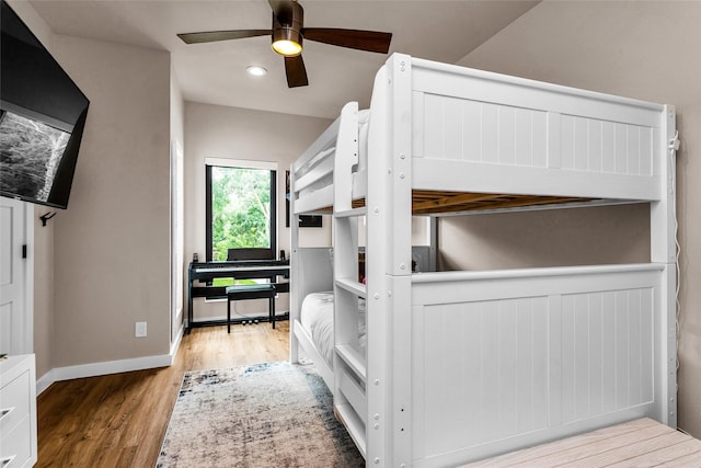 2856 Peninsula Dr, Grapevine, TX 76051 - bedroom featuring baseboards, a ceiling fan, recessed lighting, and wood finished floors