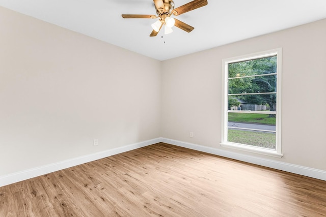 1004 Meridith Dr, Terrell, TX 75160 - unfurnished room with baseboards, a ceiling fan, and light wood-style flooring