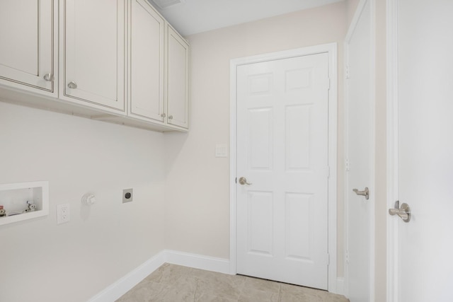 1004 Meridith Dr, Terrell, TX 75160 - clothes washing area with cabinet space, hookup for an electric dryer, baseboards, and hookup for a washing machine