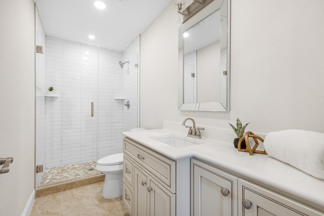 1004 Meridith Dr, Terrell, TX 75160 - bathroom featuring vanity, recessed lighting, a stall shower, and toilet