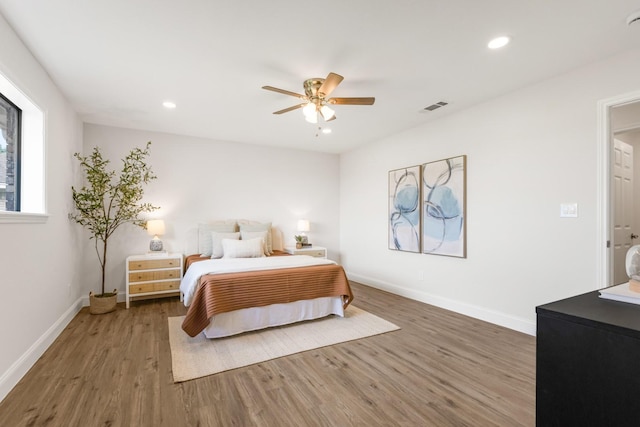 1004 Meridith Dr, Terrell, TX 75160 - bedroom featuring recessed lighting, baseboards, visible vents, and wood finished floors
