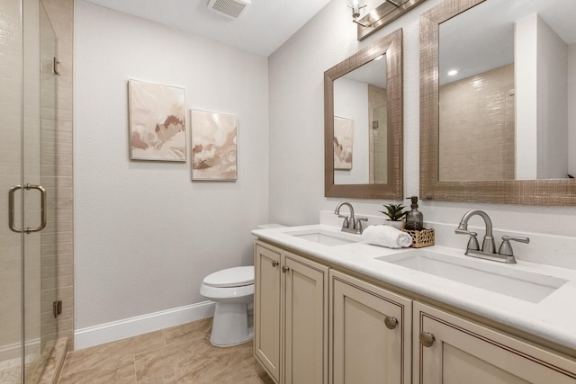 1004 Meridith Dr, Terrell, TX 75160 - bathroom with toilet, a sink, and a stall shower