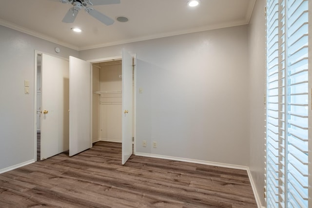 2103 Juanita Dr, Arlington, TX 76013 - unfurnished bedroom with crown molding, a closet, wood finished floors, baseboards, and recessed lighting