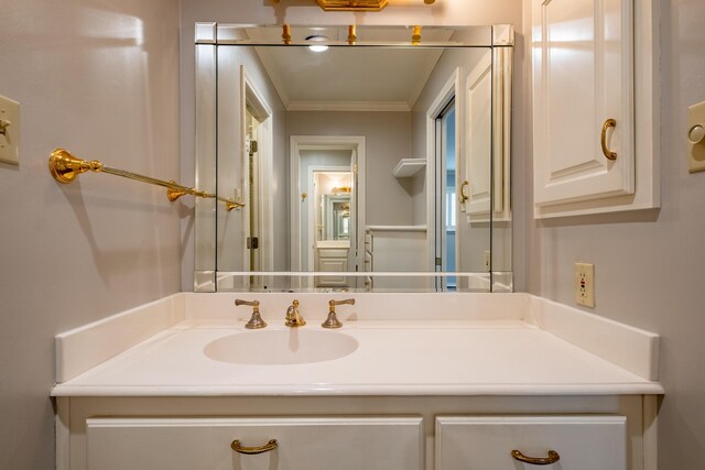 2103 Juanita Dr, Arlington, TX 76013 - bathroom with vanity and ornamental molding