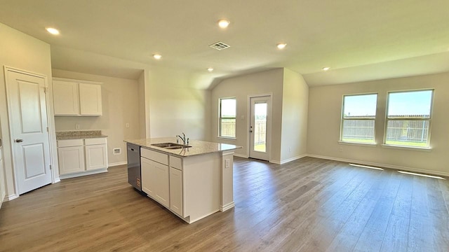 601 Banks Pl, Josephine, TX 75135 - kitchen with a sink, stainless steel dishwasher, white cabinets, wood finished floors, and a center island with sink