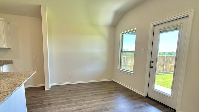 601 Banks Pl, Josephine, TX 75135 - unfurnished dining area with plenty of natural light, wood finished floors, baseboards, and lofted ceiling