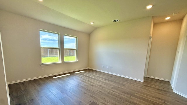 601 Banks Pl, Josephine, TX 75135 - spare room featuring wood finished floors, recessed lighting, baseboards, and vaulted ceiling