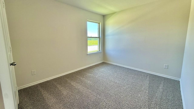 601 Banks Pl, Josephine, TX 75135 - spare room featuring dark carpet and baseboards
