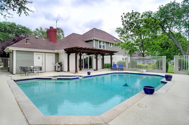 outdoor pool featuring area for grilling, a pergola, fence, and a patio area