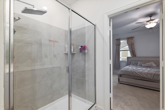 full bathroom with ceiling fan, ensuite bathroom, and a stall shower