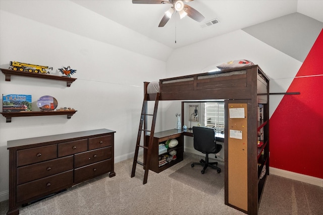 bedroom featuring carpet floors, baseboards, visible vents, and vaulted ceiling