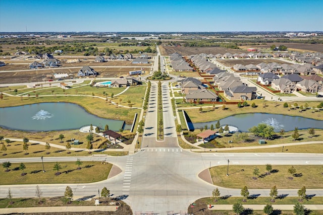 aerial view with a residential view and a water view