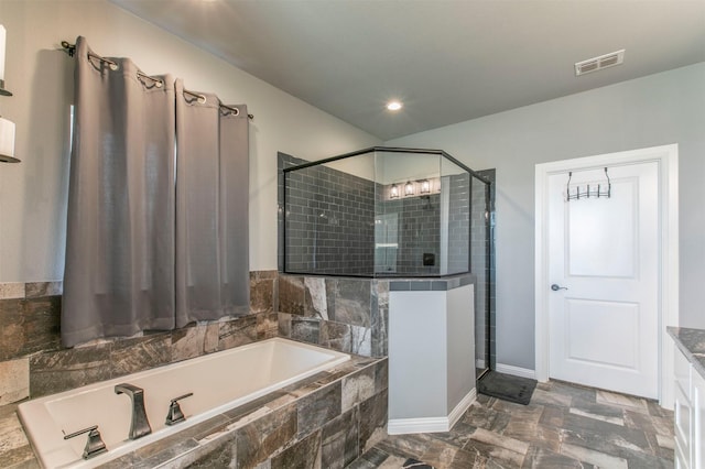 250 Beulah Rd, Millsap, TX 76066 - full bath with recessed lighting, baseboards, visible vents, a garden tub, and a stall shower