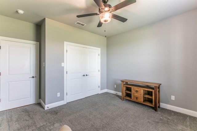 250 Beulah Rd, Millsap, TX 76066 - unfurnished bedroom with carpet floors, baseboards, ceiling fan, and visible vents