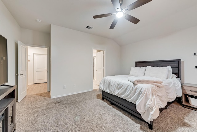 bedroom with visible vents, carpet floors, baseboards, a ceiling fan, and vaulted ceiling