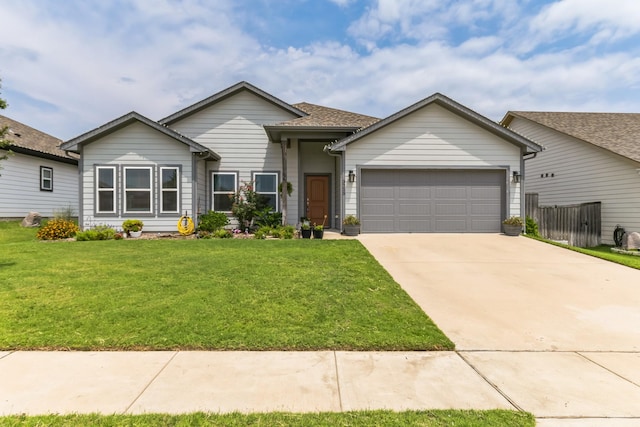 3225 Sweetwater Way, Sherman, TX 75090 - view of front of house with a garage, fence, driveway, and a front lawn