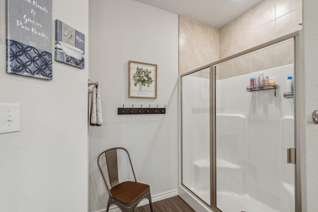 3225 Sweetwater Way, Sherman, TX 75090 - bathroom with baseboards, wood finished floors, and a shower stall