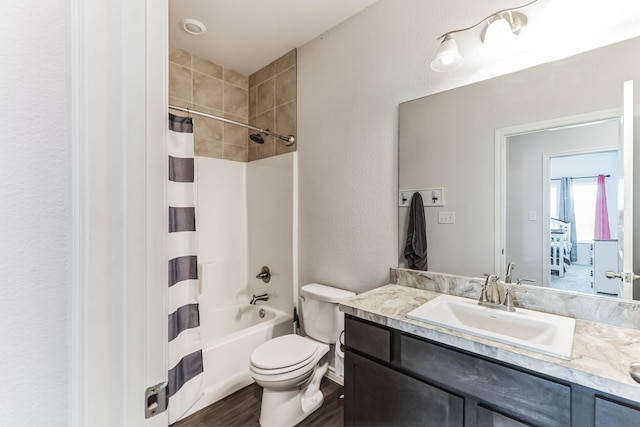 3225 Sweetwater Way, Sherman, TX 75090 - full bathroom with vanity, shower / bath combo with shower curtain, toilet, and wood finished floors