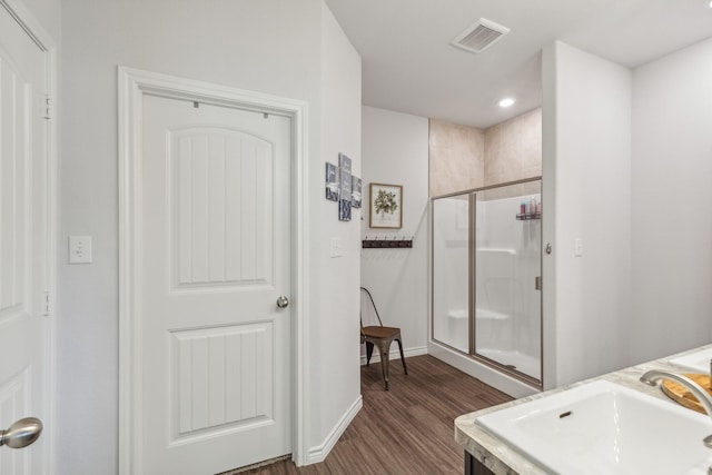 3225 Sweetwater Way, Sherman, TX 75090 - full bath featuring visible vents, a shower stall, wood finished floors, a sink, and baseboards