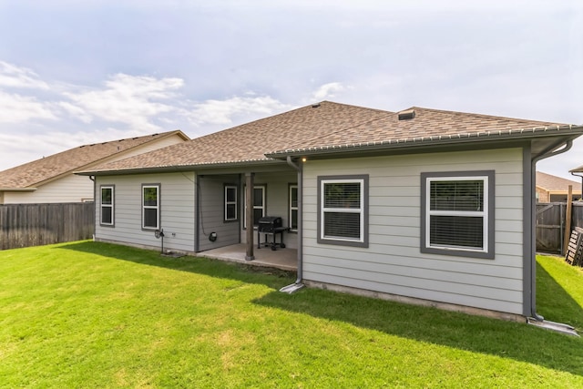 3225 Sweetwater Way, Sherman, TX 75090 - rear view of property featuring a fenced backyard, a patio, a shingled roof, and a yard