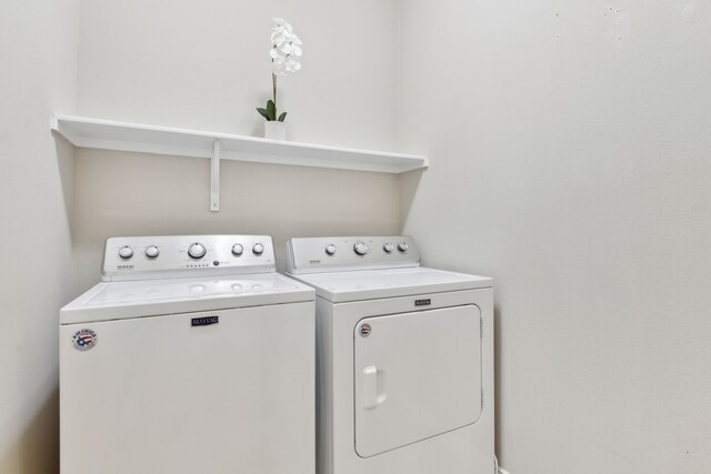 6281 Paragon Dr, Frisco, TX 75036 - washroom featuring laundry area and washing machine and clothes dryer