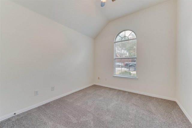 unfurnished room with carpet floors, a ceiling fan, and a healthy amount of sunlight