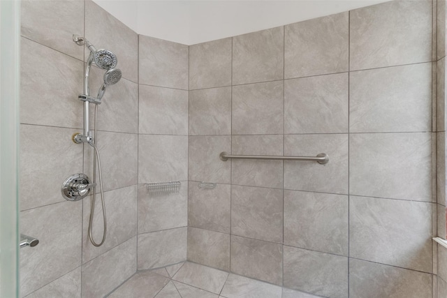 details with a tile shower