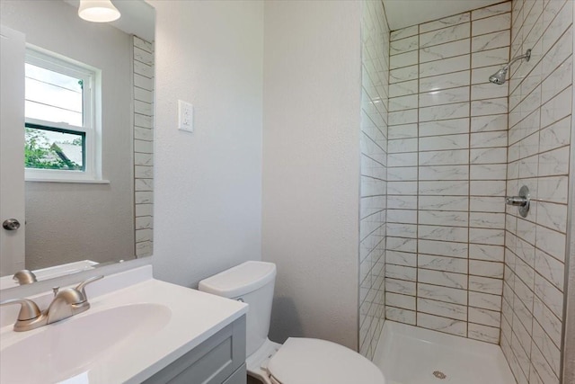 1017 SE 21st St, Mineral Wells, TX 76067 - bathroom with vanity, a stall shower, and toilet