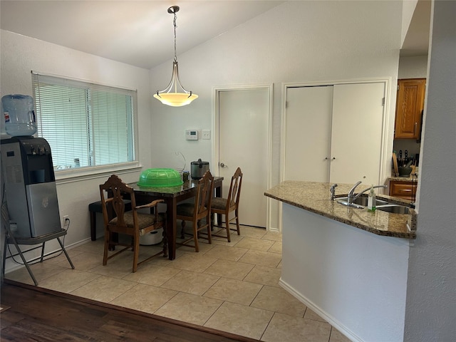 dining room with lofted ceiling