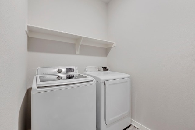 1732 Journey Forth Trl, Wylie, TX 75098 - laundry area with separate washer and dryer, baseboards, and laundry area