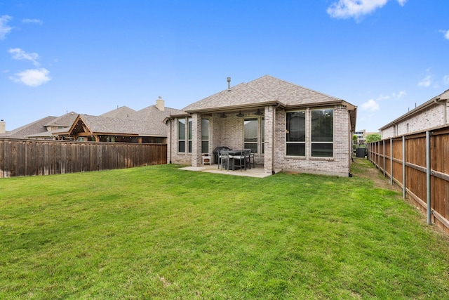 1732 Journey Forth Trl, Wylie, TX 75098 - rear view of house with a fenced backyard, a patio, and brick siding