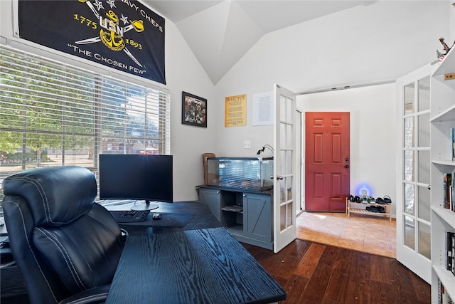 home office with french doors, wood finished floors, and lofted ceiling