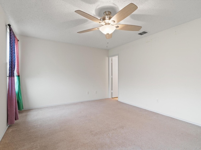1728 Creek Bend Ln, Little Elm, TX 75068 - empty room featuring ceiling fan, visible vents, and light carpet