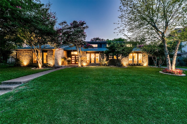 7509 Spring Meadow Ln, Garland, TX 75044 - view of front of property with a front yard