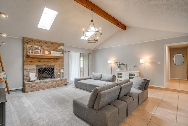 living area featuring a textured ceiling, a brick fireplace, lofted ceiling with skylight, and light tile patterned flooring