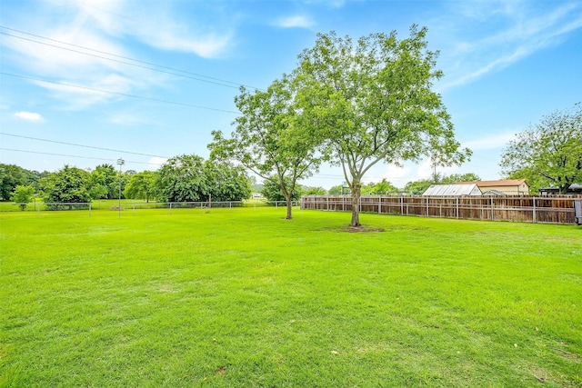 view of yard with fence