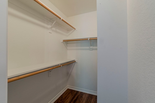 315 Lakeside Dr, Rockwall, TX 75032 - spacious closet featuring dark wood-style floors