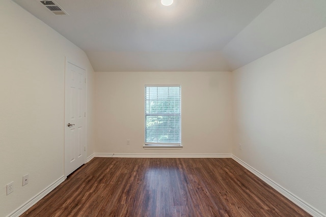 315 Lakeside Dr, Rockwall, TX 75032 - empty room with dark wood finished floors, baseboards, and lofted ceiling