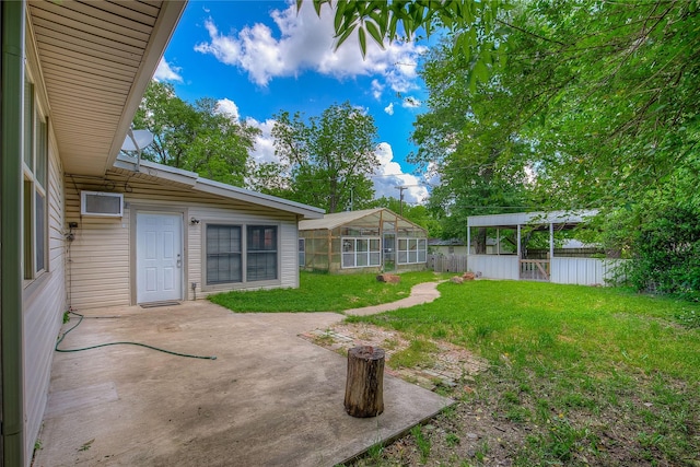 view of yard featuring fence and a patio area