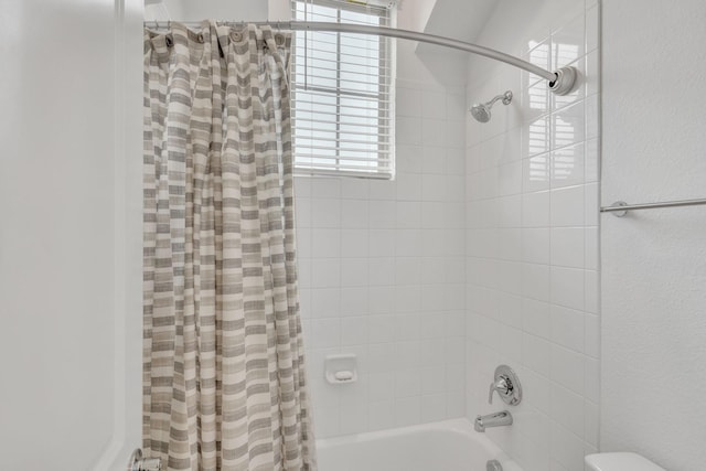 full bath featuring shower / bath combo with shower curtain